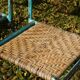 Wrought iron and rattan garden chairs