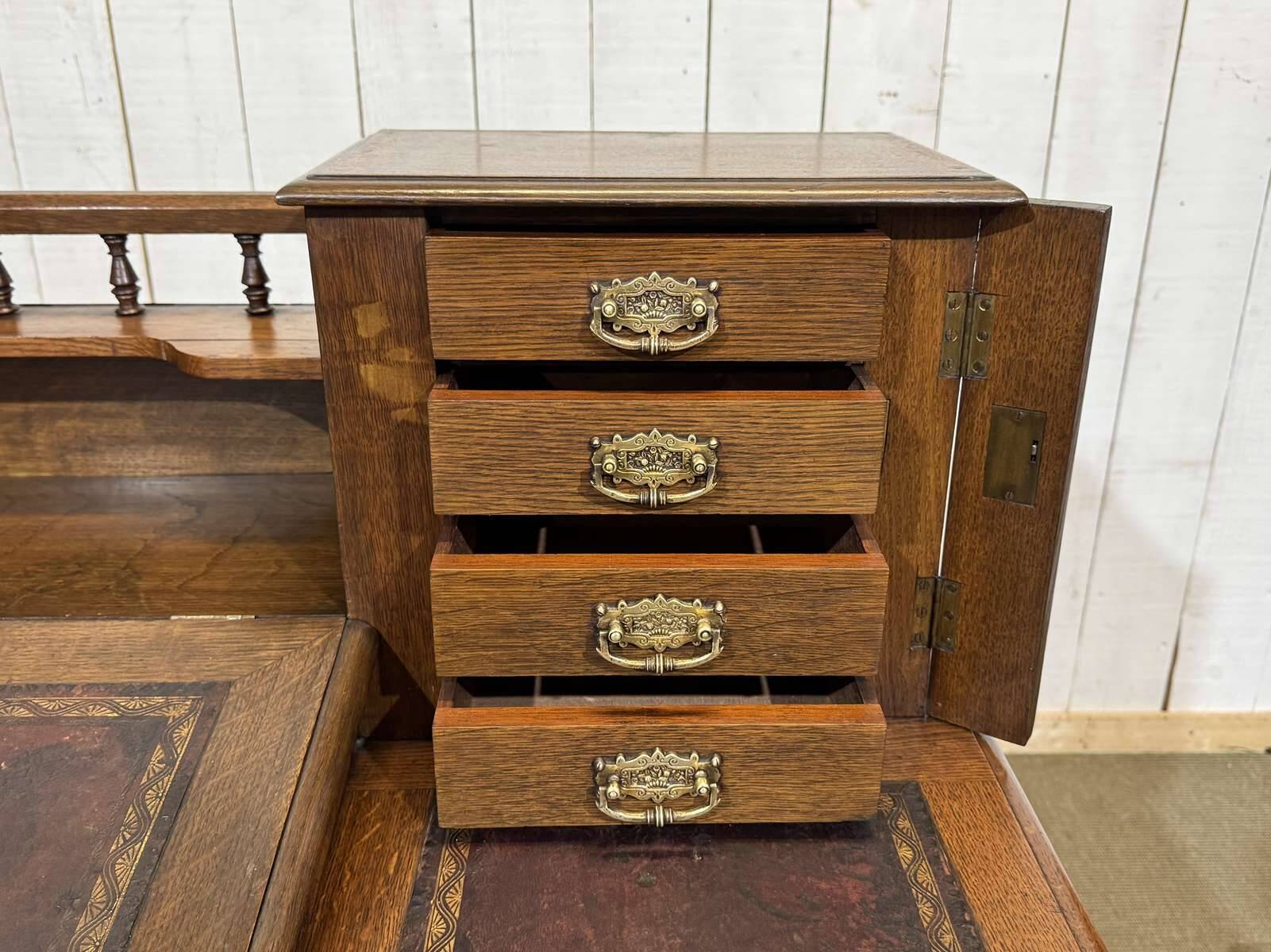 English oak graduated desk from the late 19th century.