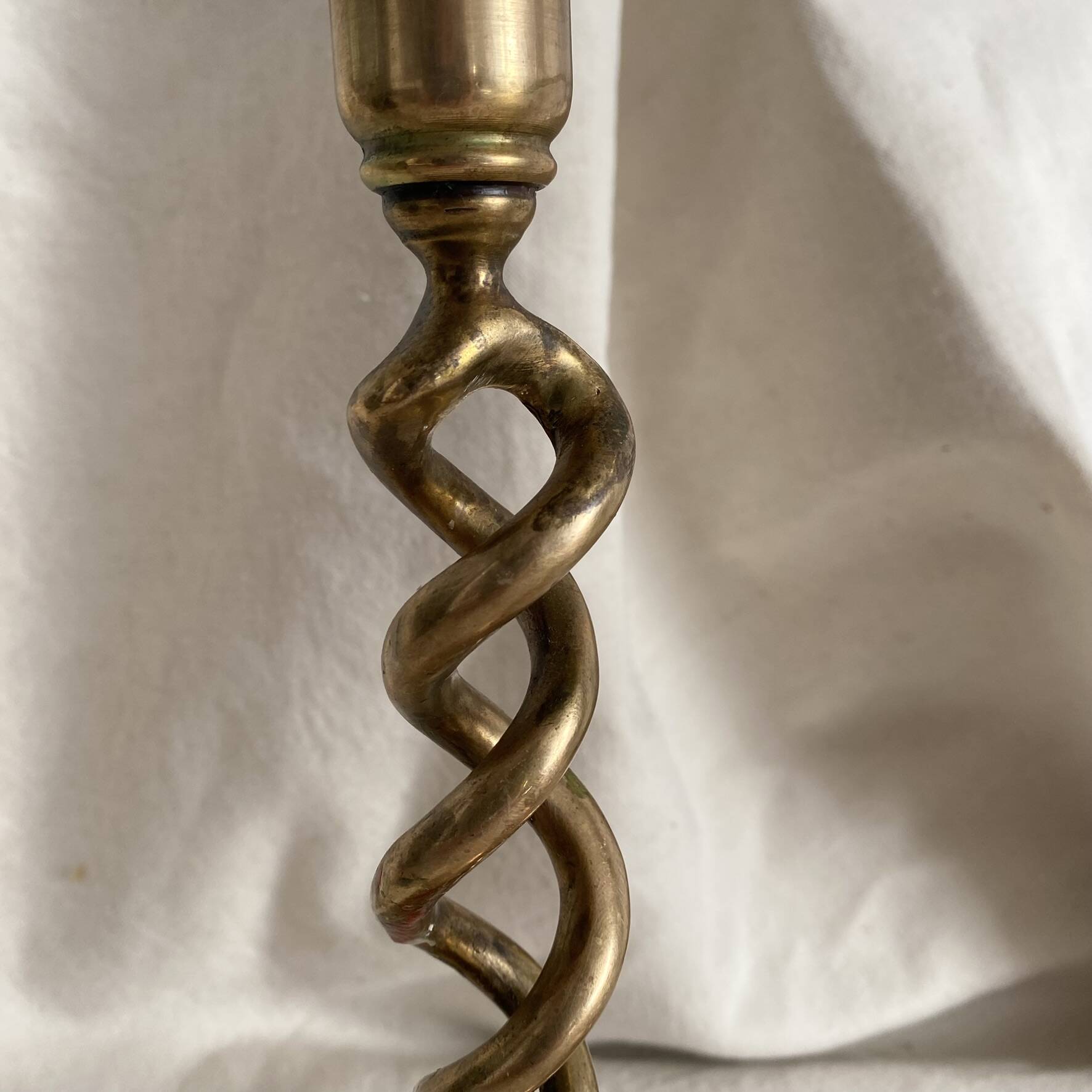 Pair of twisted brass candlesticks