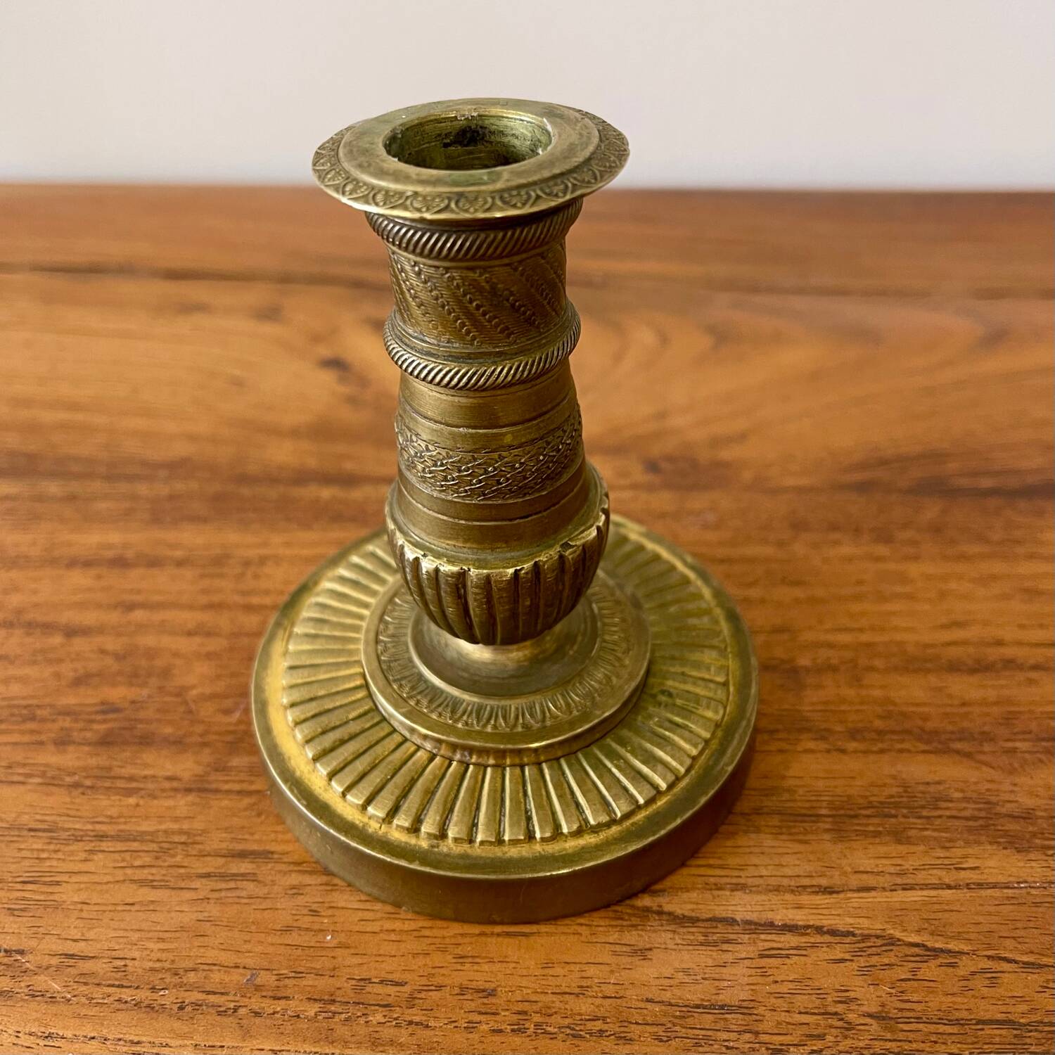 Engraved brass candle holder
