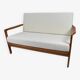 1960s canapé, in teak and white boucle.