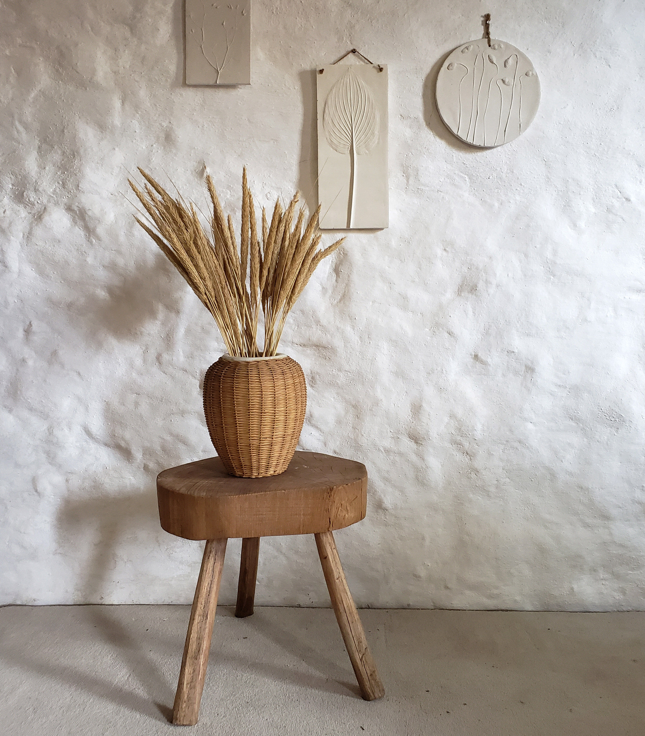 Sandstone and rattan vase