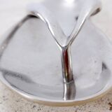 Aluminum pocket emptier flip flop