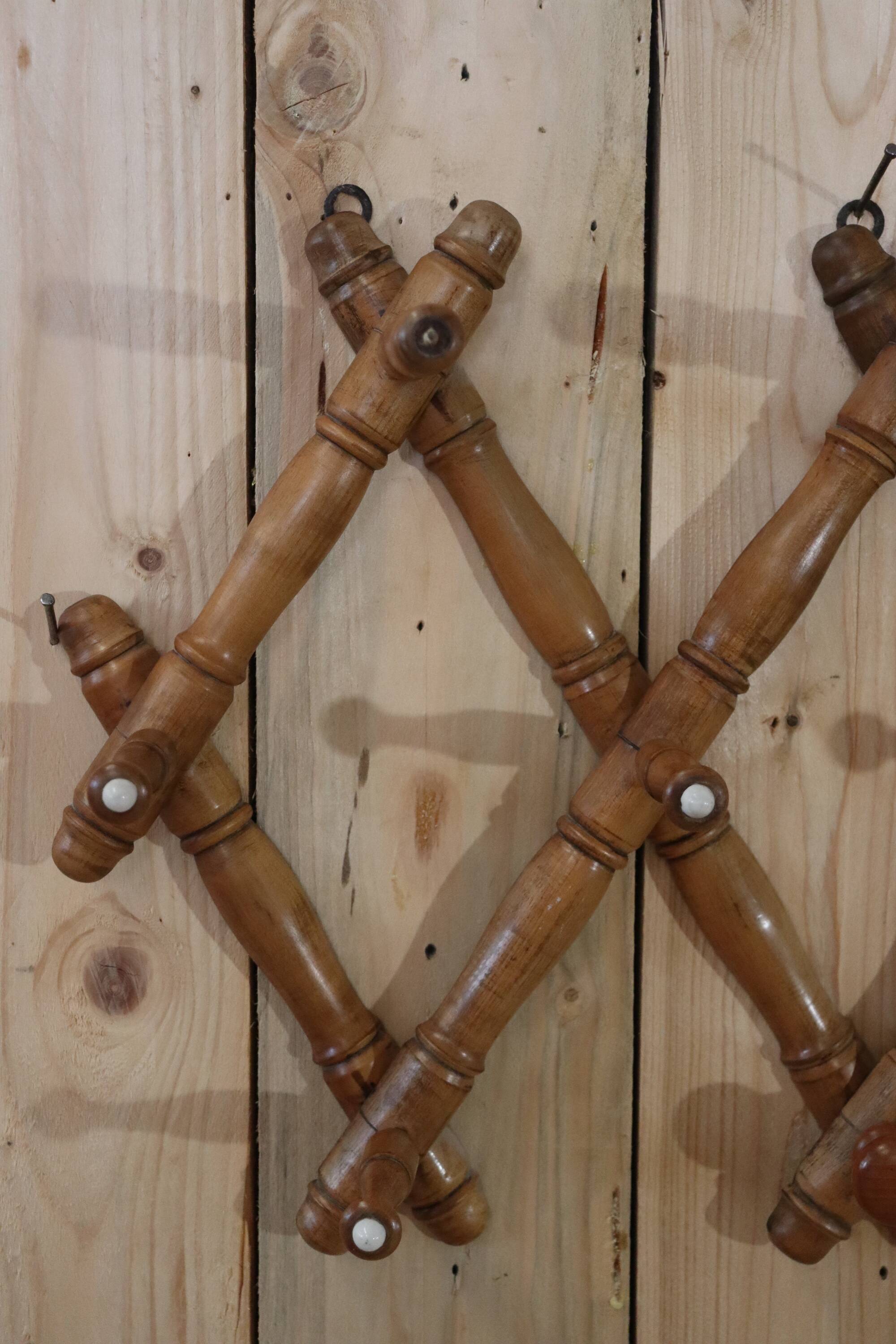 Old turned wooden wall coat rack