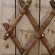 Old turned wooden wall coat rack
