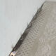 Stainless steel butcher's hook, known as a "wolf tooth bar."