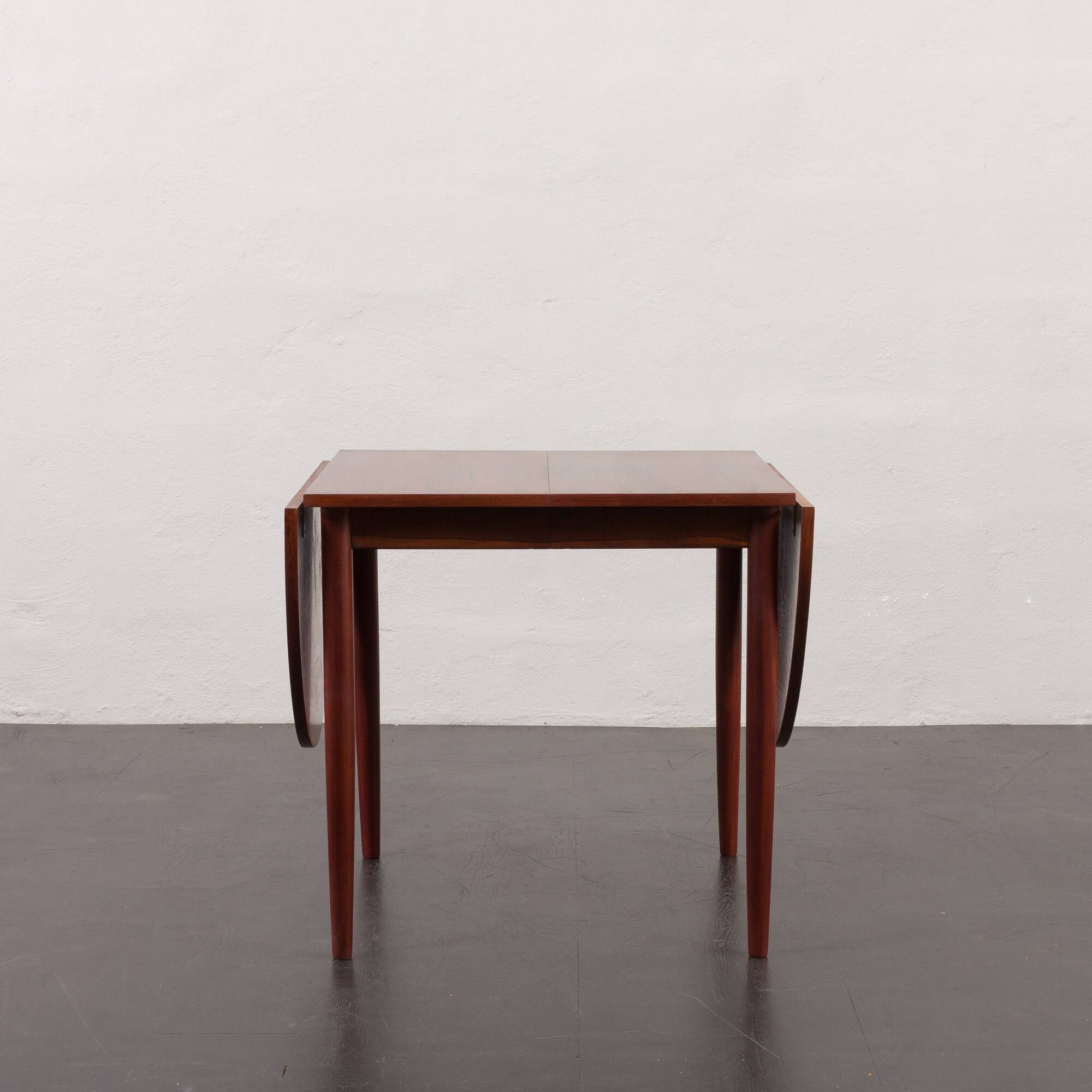 Arne Vodder style rosewood drop-leaf dining table, Denmark, 1960s
