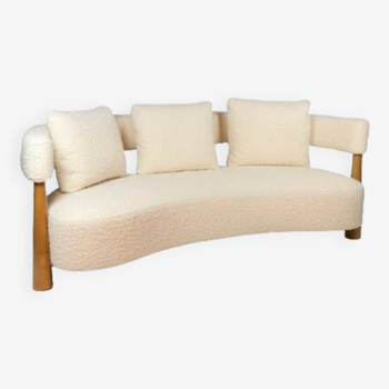 “Bean” shaped 3-seater sofa, in blond beech. Contemporary work