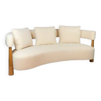 “Bean” shaped 3-seater sofa, in blond beech. Contemporary work