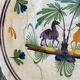 Old dish camels and palm trees restored