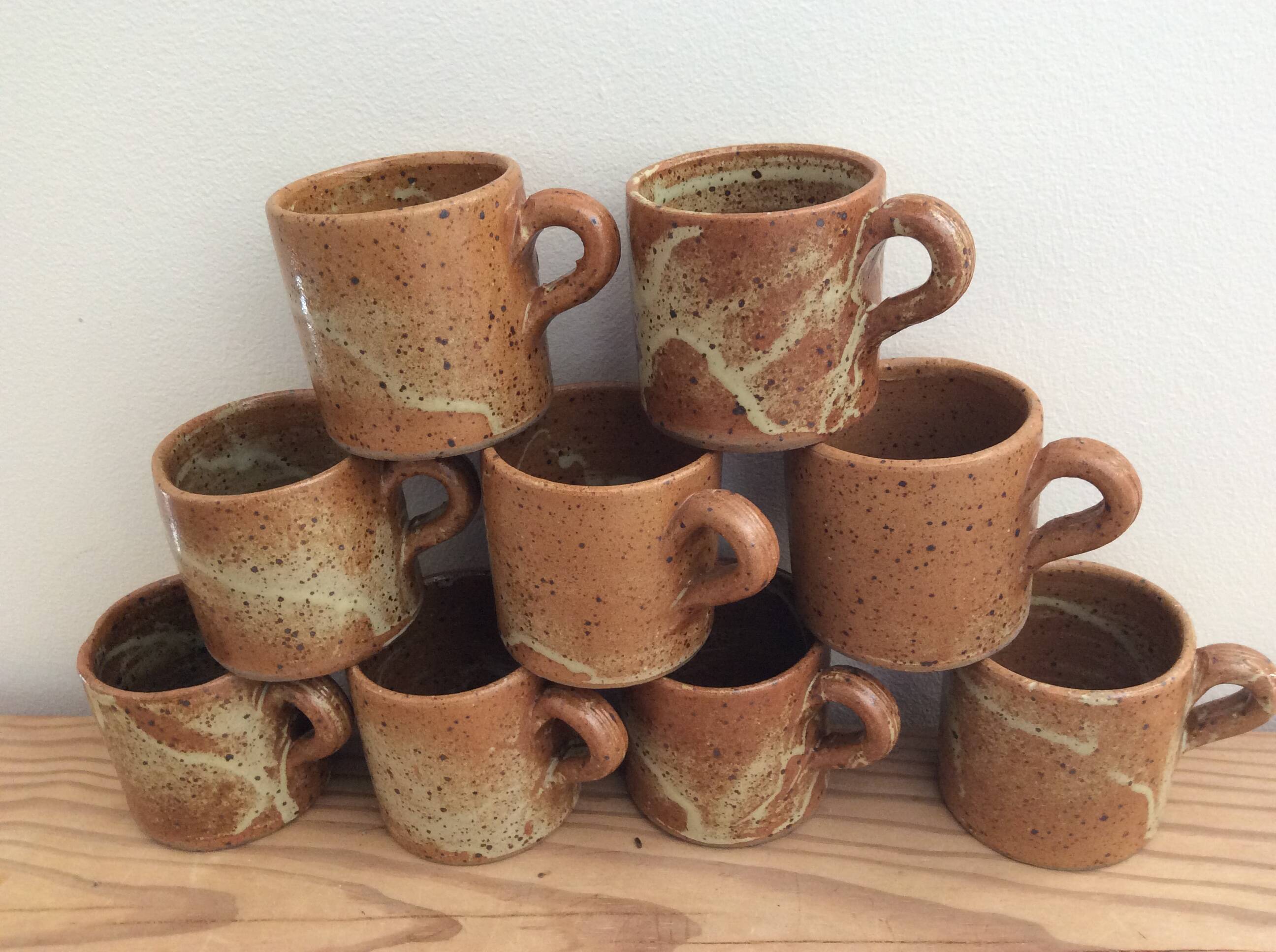 9 stoneware coffee cups