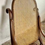 Thonet rocking chair in curved wood and cane from the 1900s
