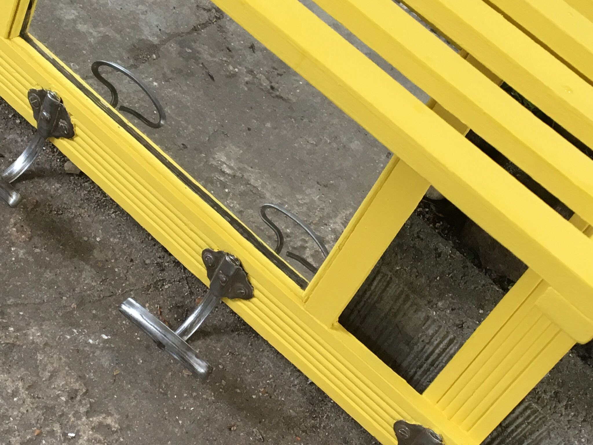 Yellow vintage coat holder