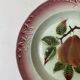 Antique shallow dish in slipware with pear decoration.