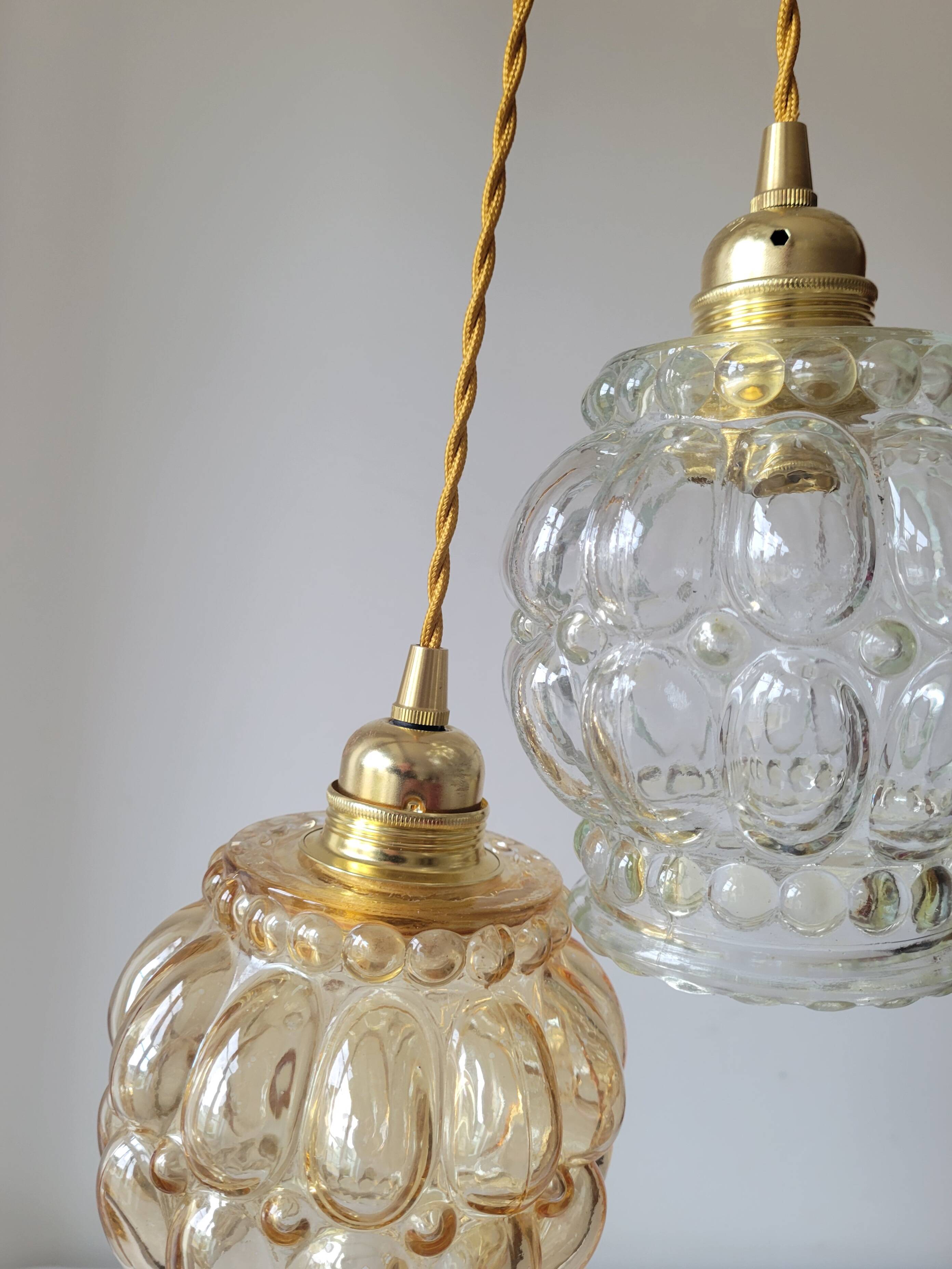 Duo of molded glass pendant lights
