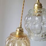 Duo of molded glass pendant lights