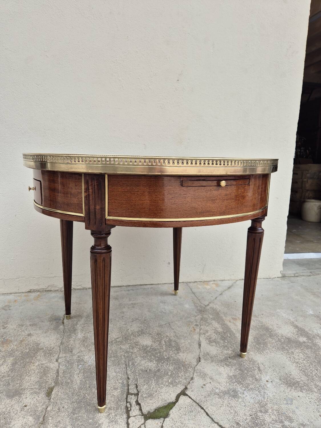 Louis XVI style mahogany bouillotte table in marquetry and bronze