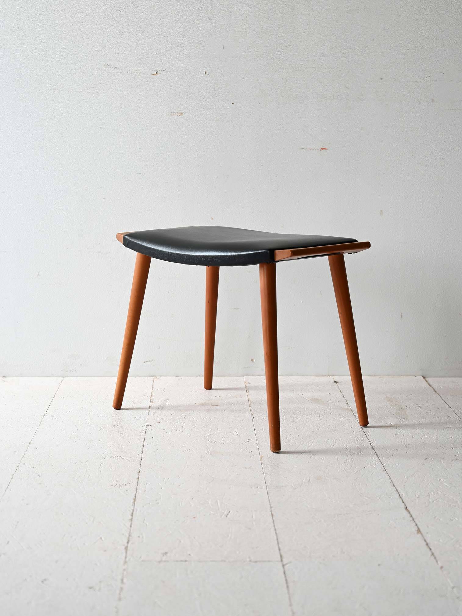 Vintage stool in wood and leather