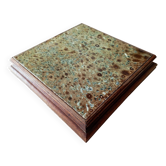 Old wood and ceramic trivet