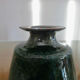 Vase en céramique dans les tons verts