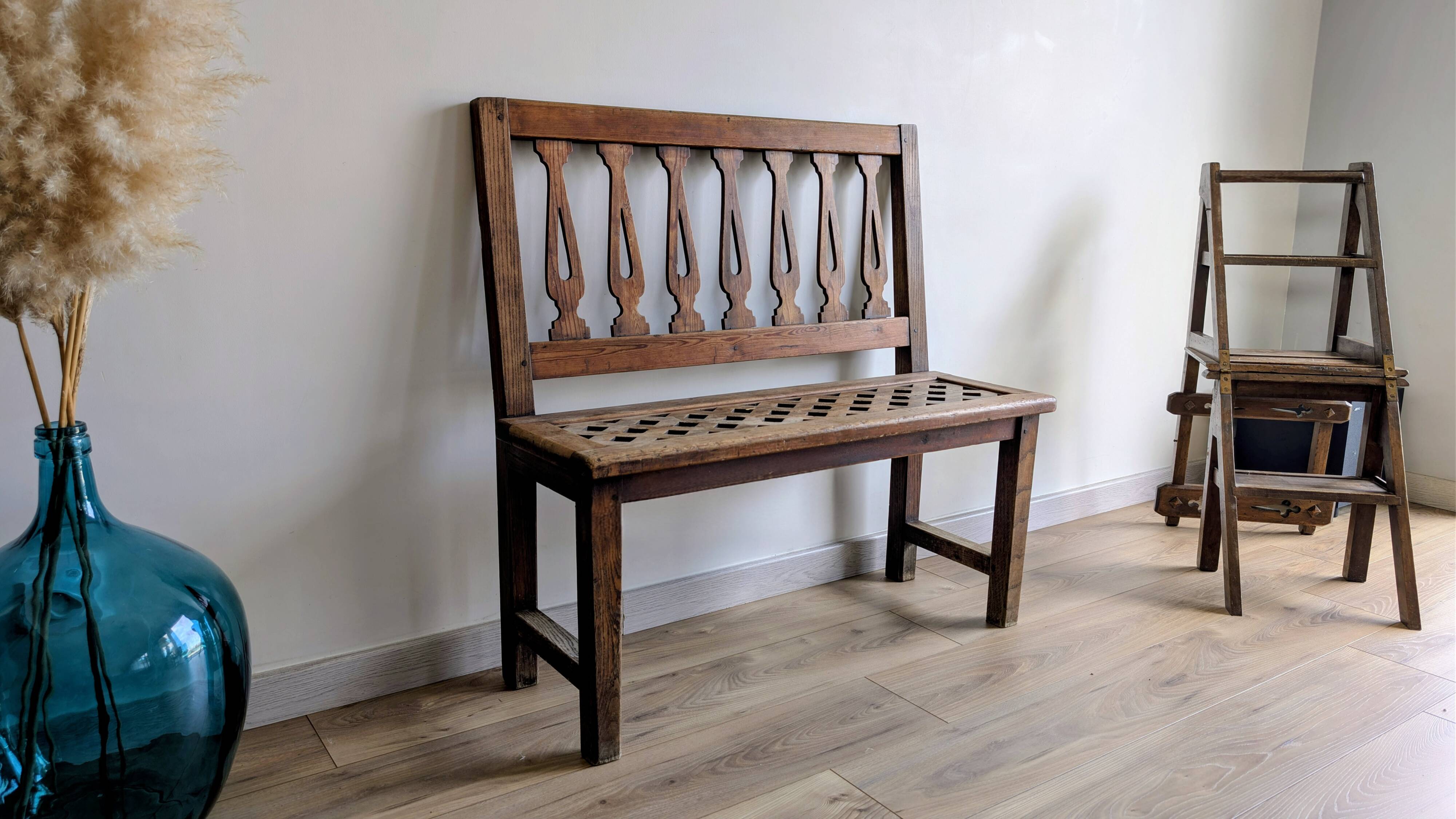Old church bench in pitch pine, rustic charm and authentic patina.