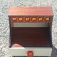 Pair of design bedside tables in orange resin rosewood with white melamine from the 70s