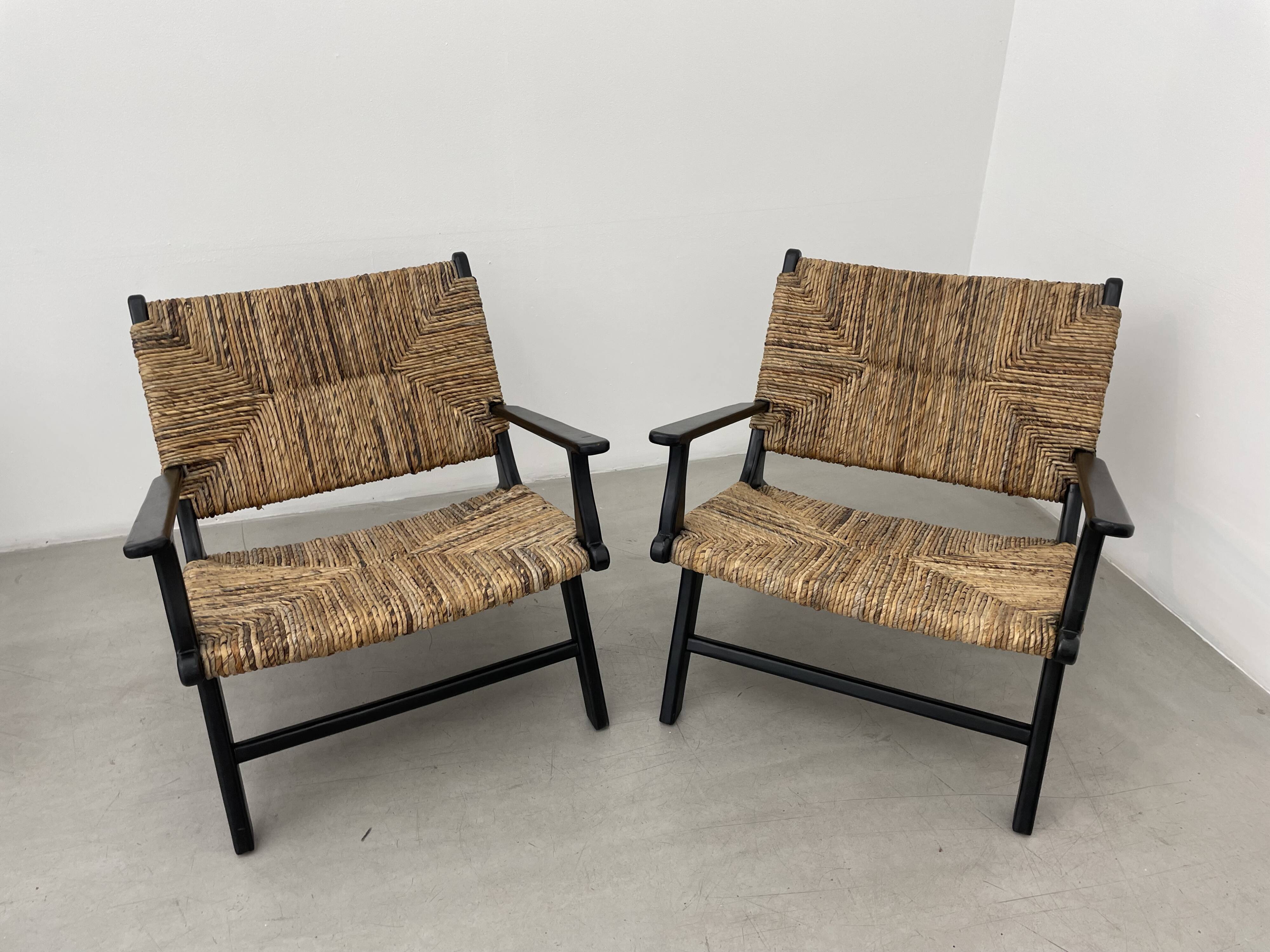 Pair of armchairs by Olivier de Schrijver in wild straw