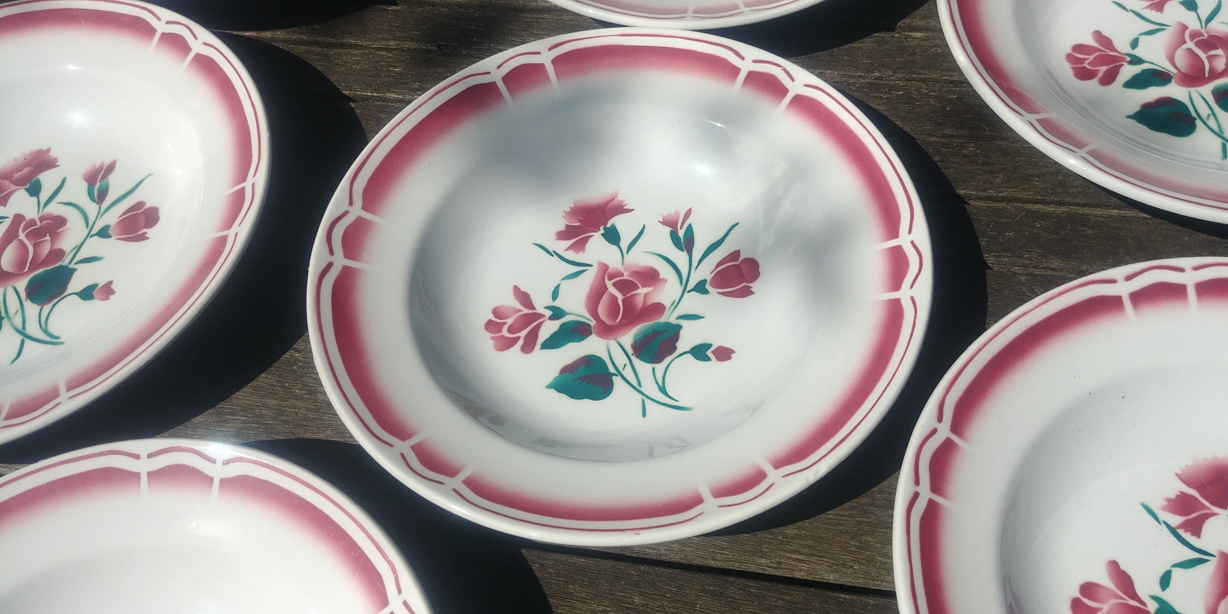 Lot of seven old soup plates from the 40s/50s decorated with roses
