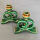 Green and gold candle holders in glazed ceramic