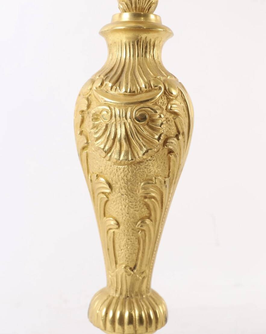 Pair of candelabra, in Louis XV style, in gilded bronze.