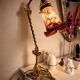 Art Nouveau lamp signed LAFLOR, marbled glass with enamel floral decoration.