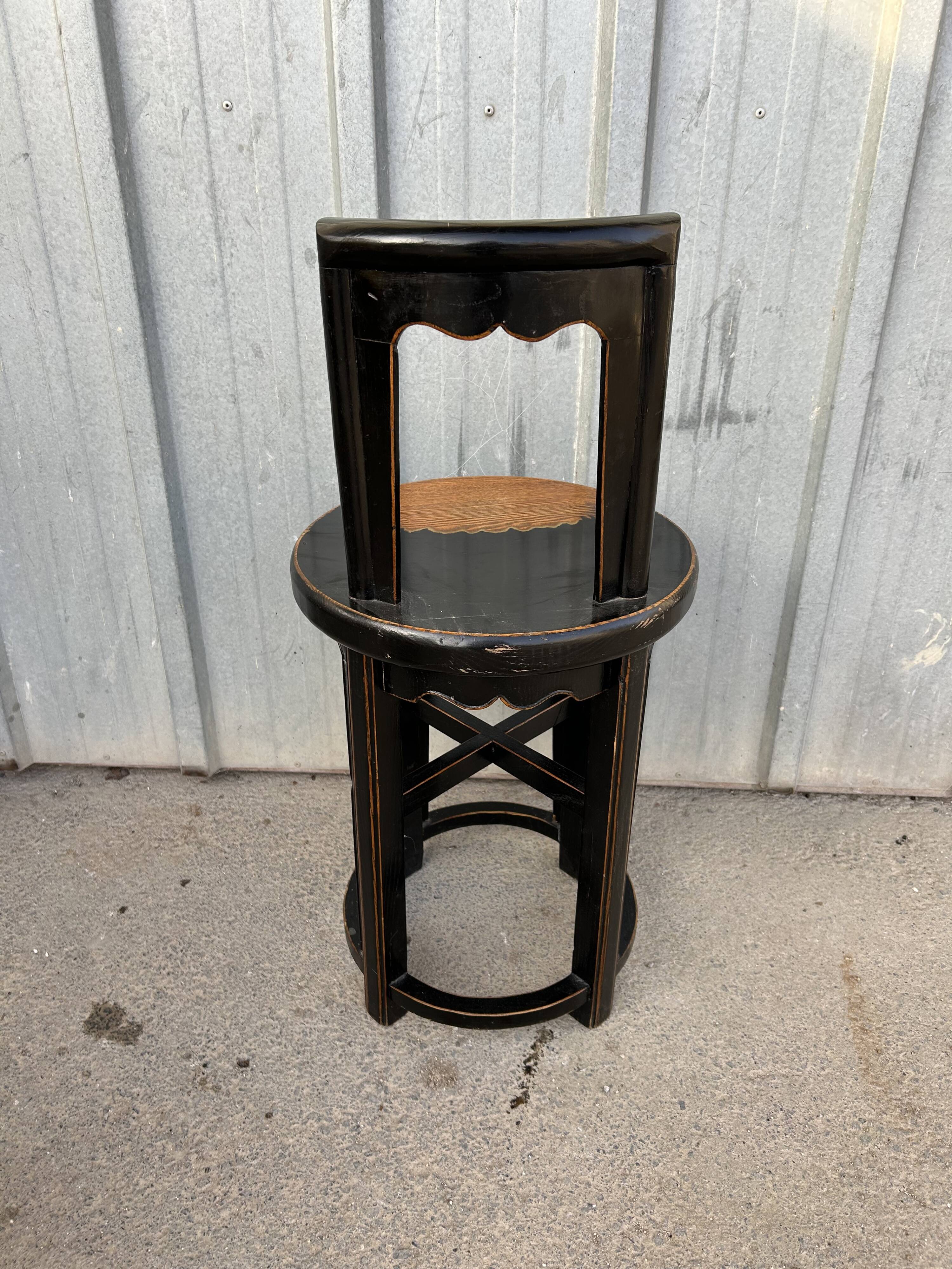 Antique Asian chair made of solid wood