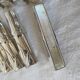 Silver bamboo knife rests from the 1980s.