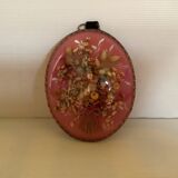 Old vintage oval dried flowers frame