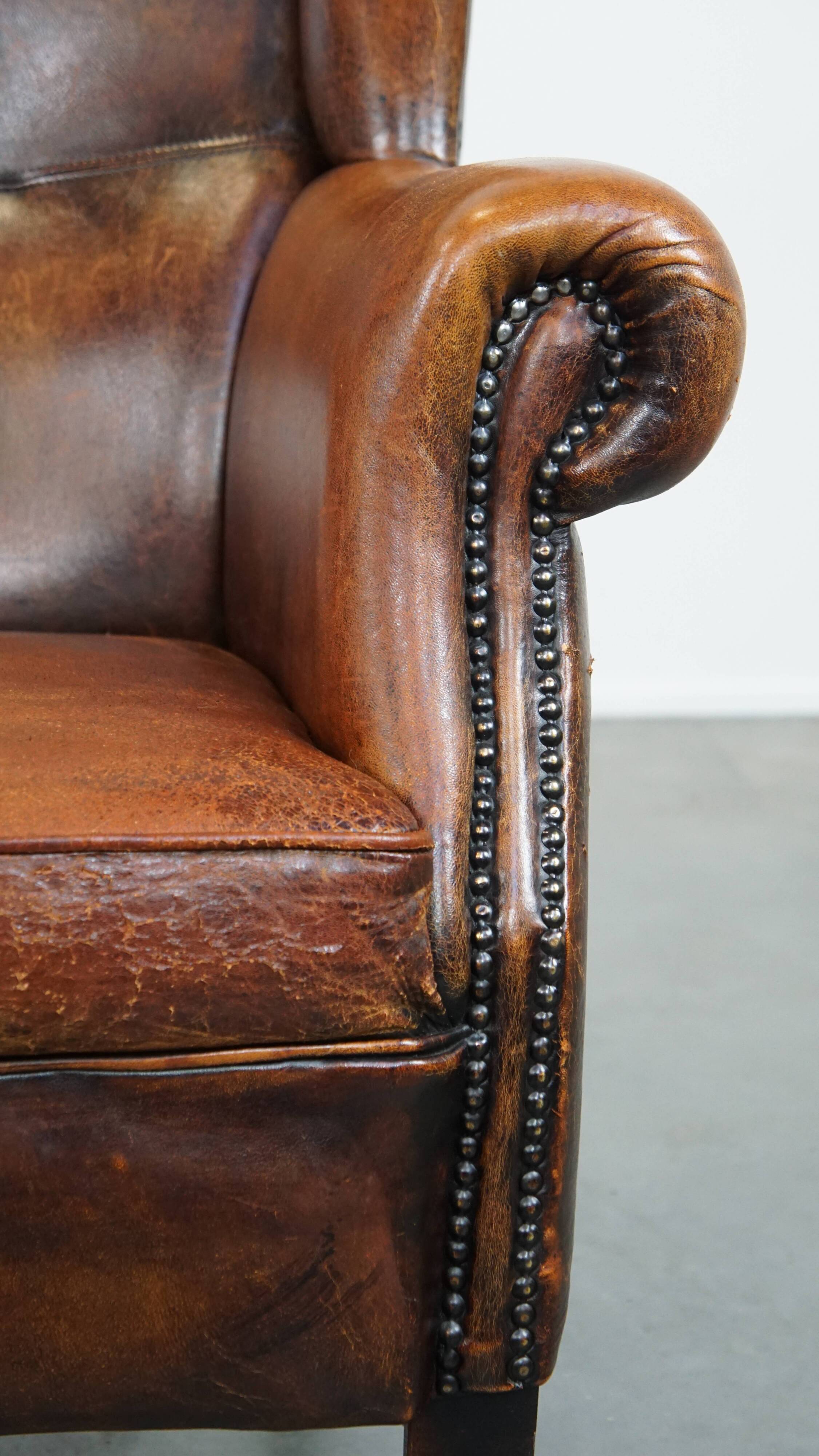 Vintage sheep leather wingback chair