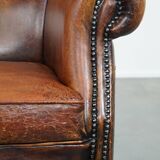 Vintage sheep leather wingback chair