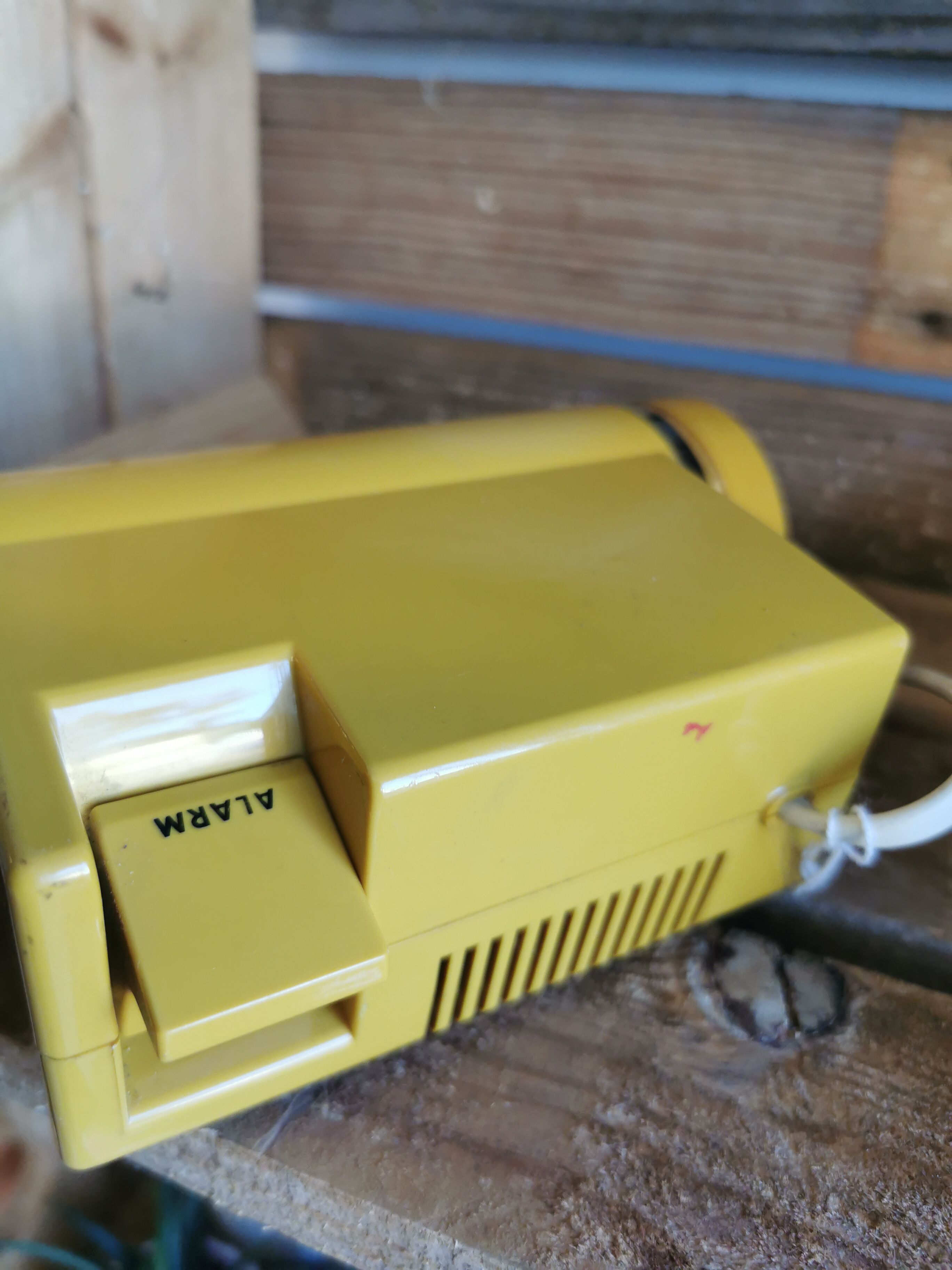 Yellow vintage sankyo alarm clock