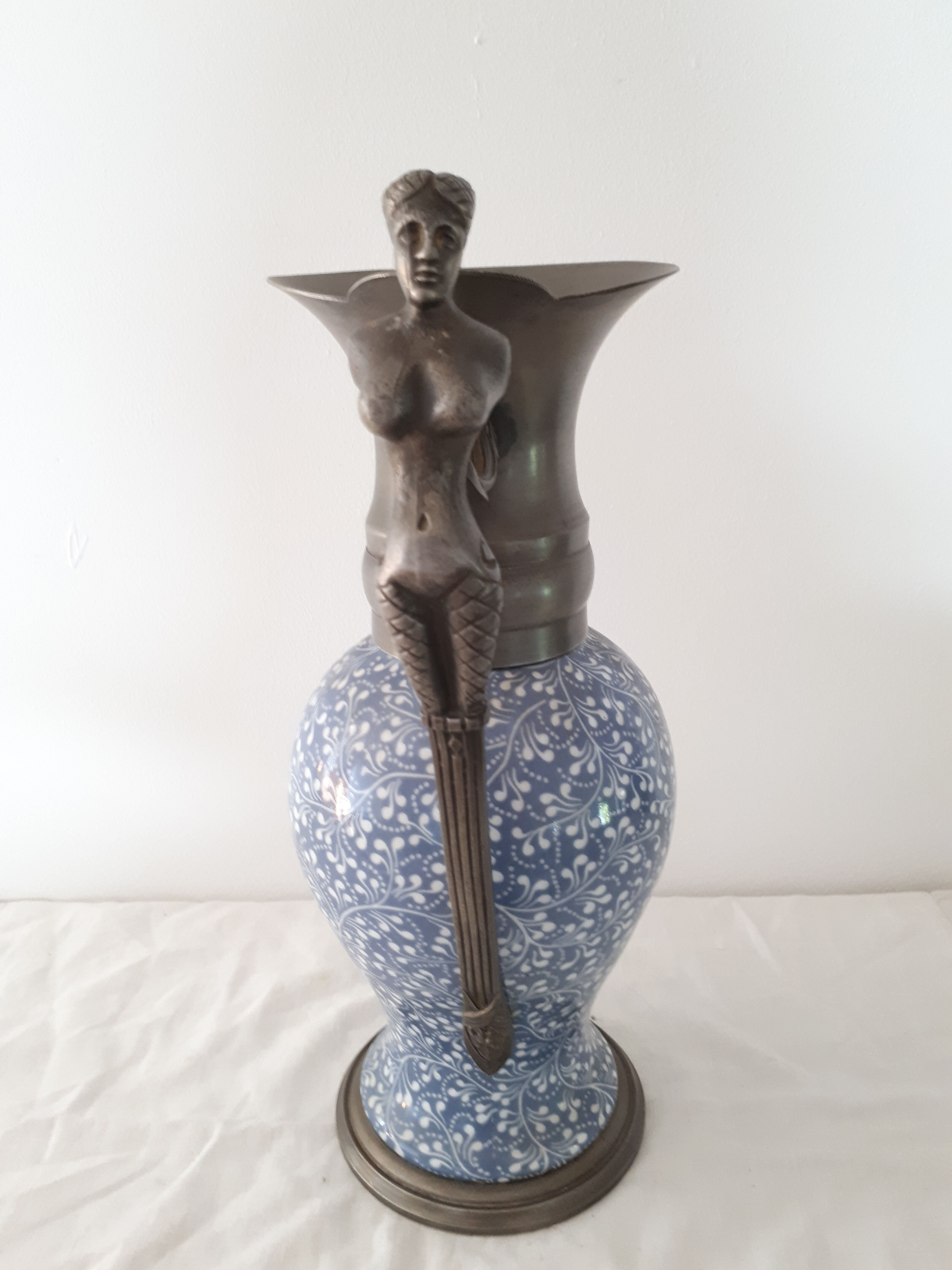 Earthenware and pewter ewer with mermaid handle