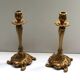 Pairs of Louis XV style gilded bronze candlesticks