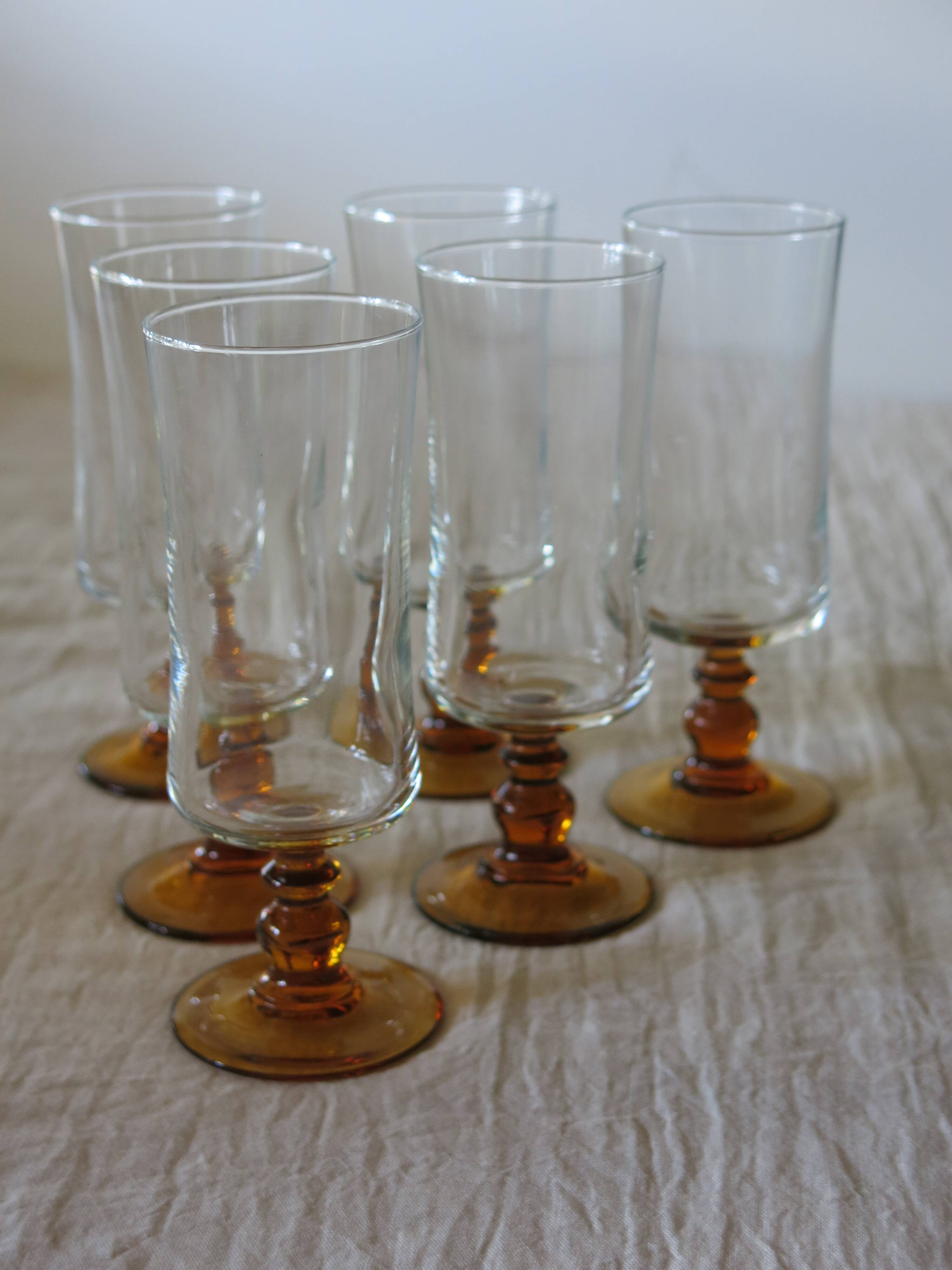 6 vintage brown footed champagne flutes in very good condition