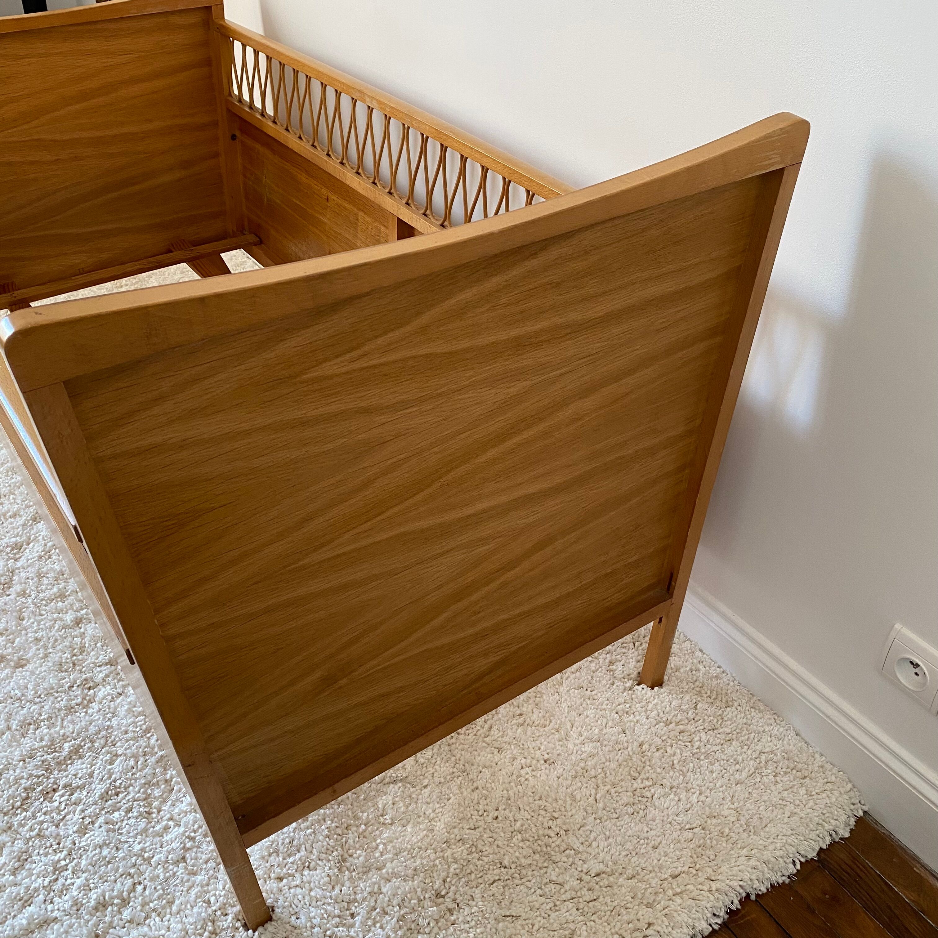 Vintage wooden baby cot and rattan strap