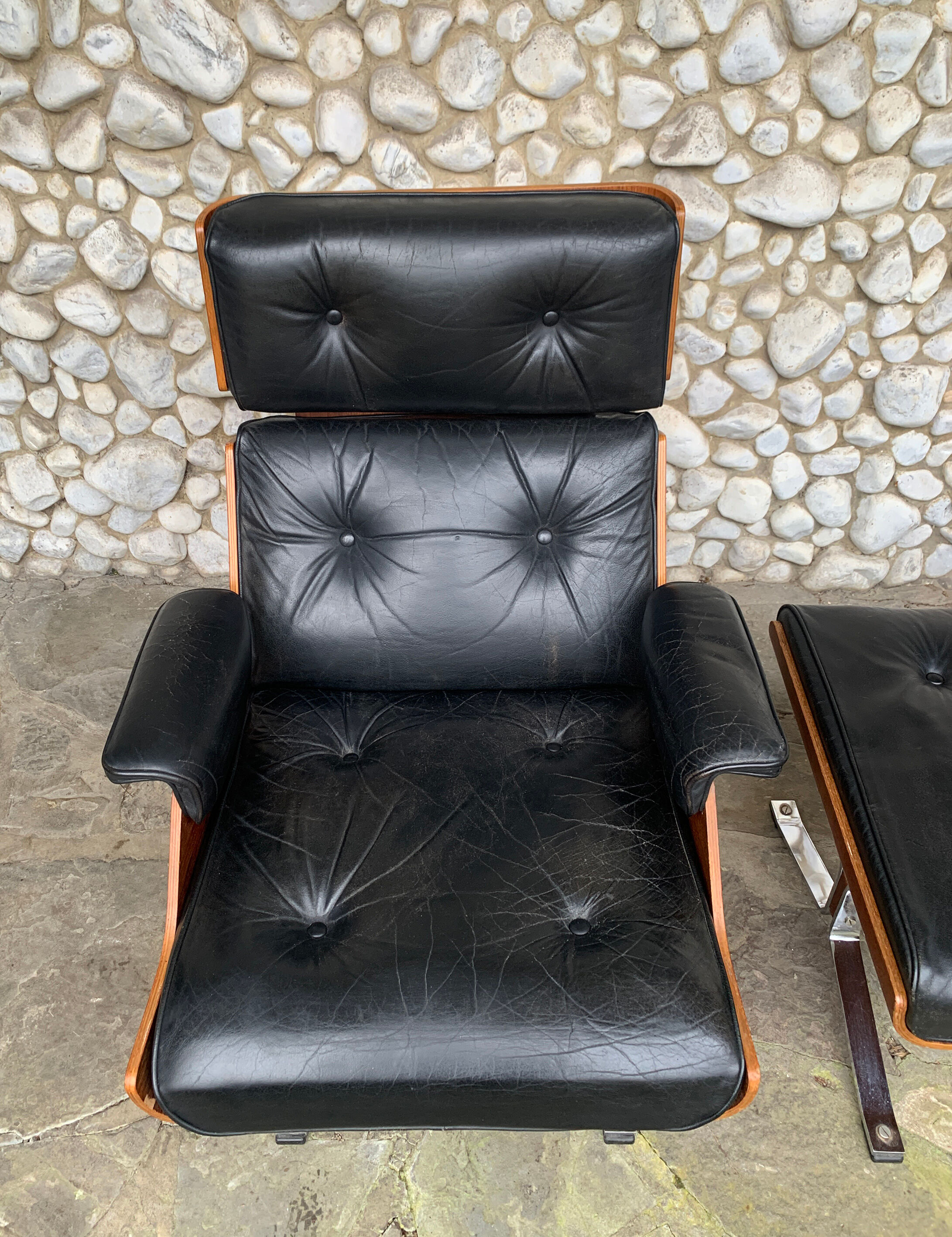 Lounge chair and ottoman black leather and teak multiplex, 1960