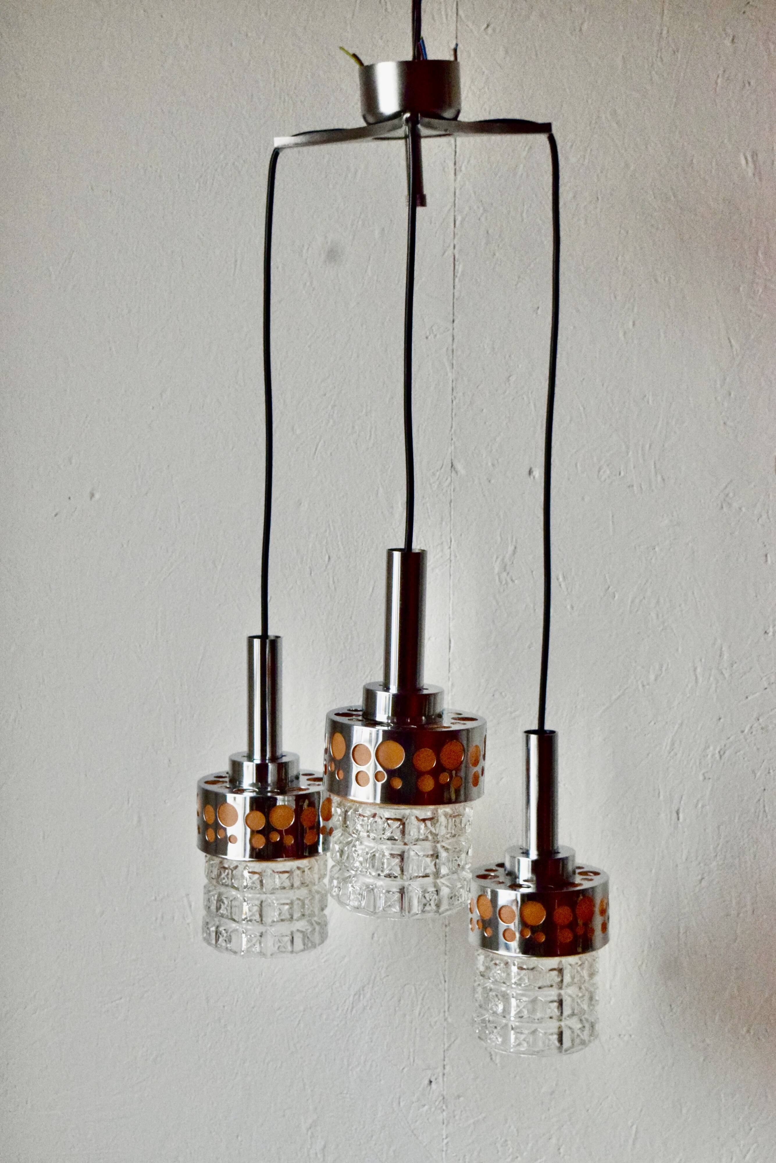 Triple vintage pendant light in molded glass, chrome metal and orange plastic - Space Age Design