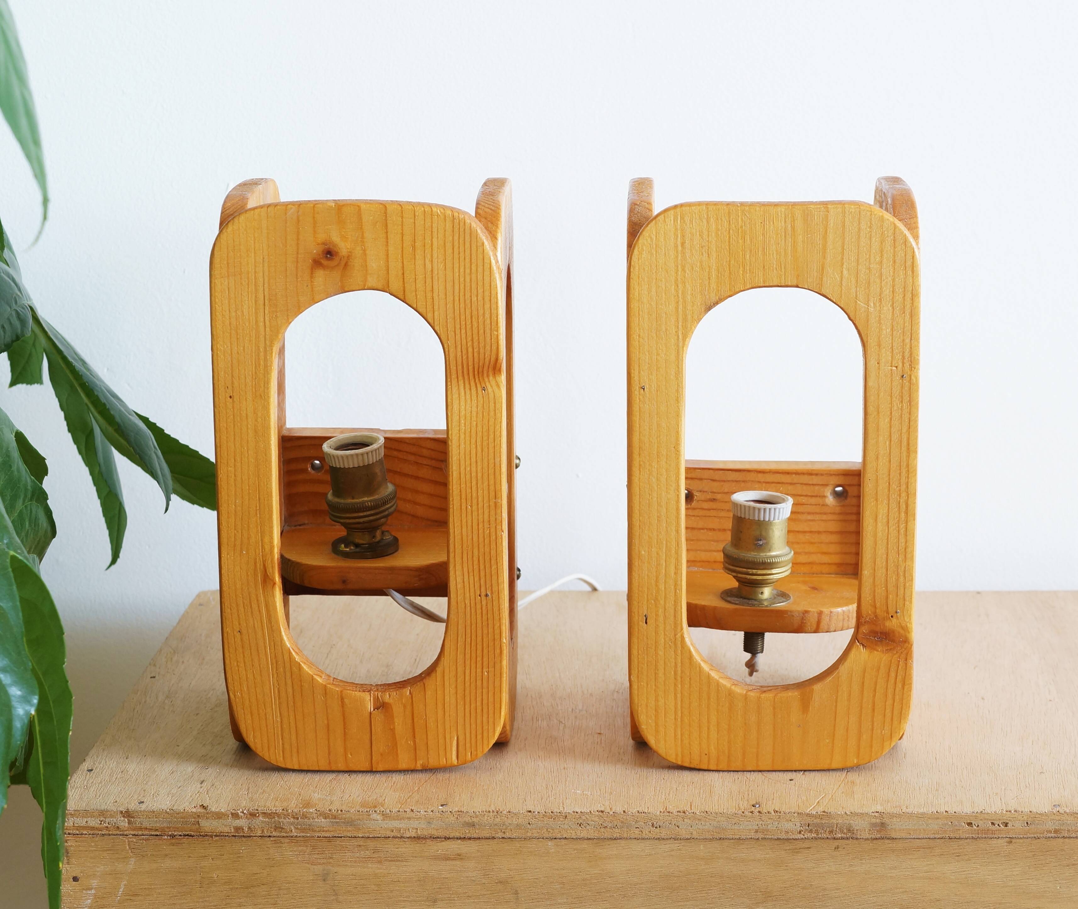 Two Scandinavian pine wall lamps in the 70s
