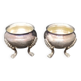 Pair of silver metal salt cellars with lion decor base