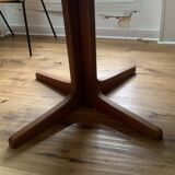 Round teak table with central leg and extension. Denmark 1960