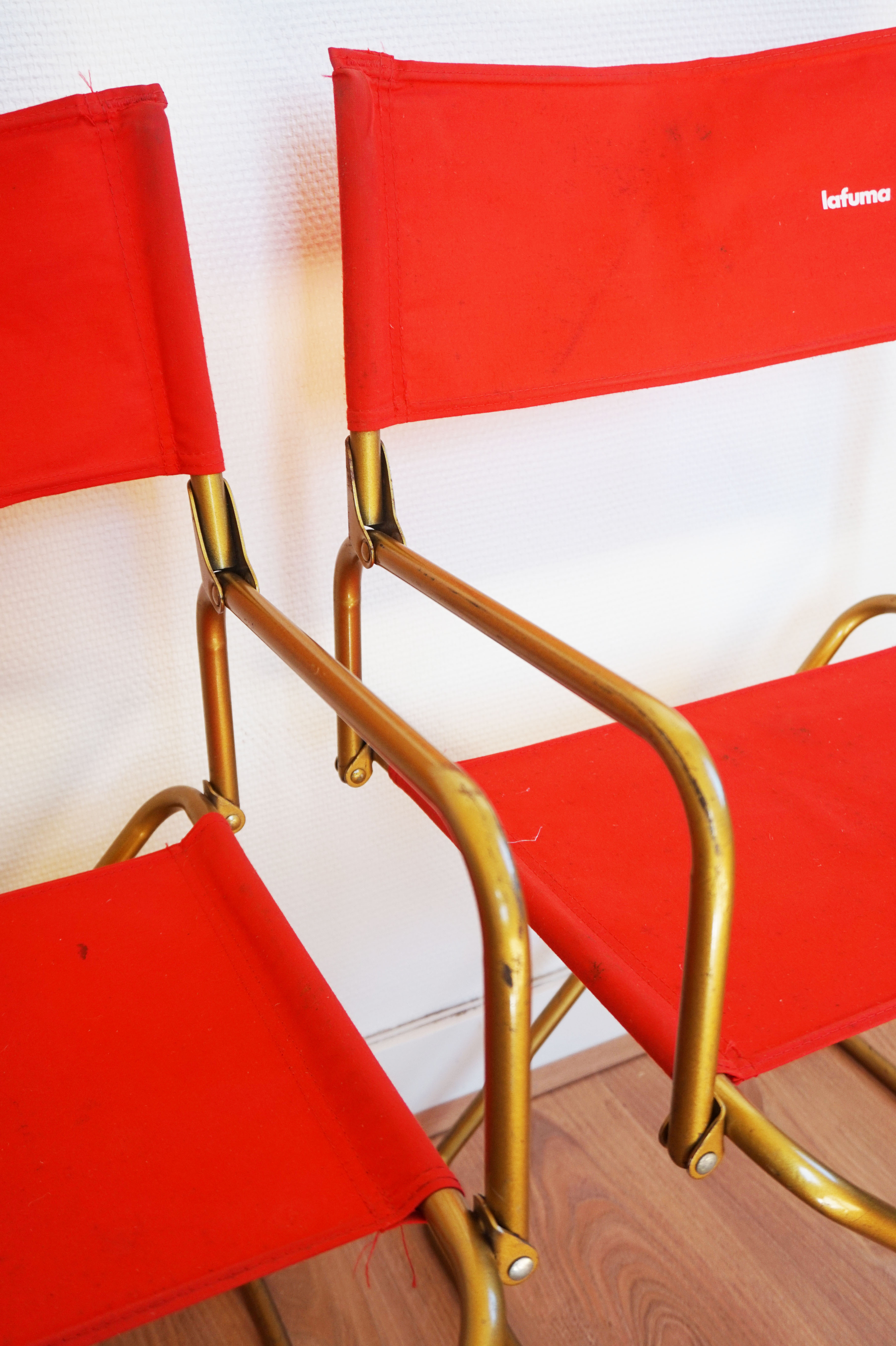 Red vintage pair of lafuma folding chairs
