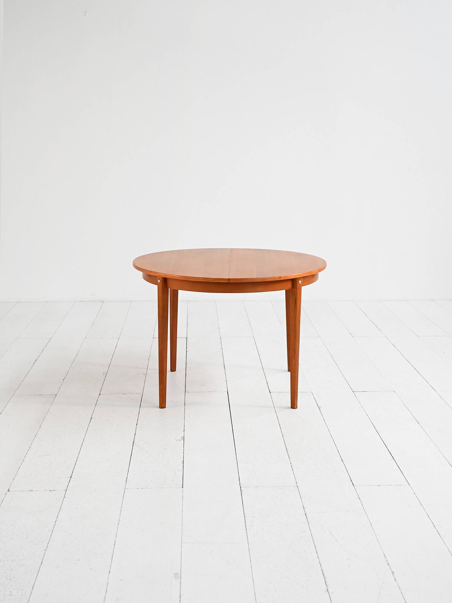 Scandinavian round extendable teak table 1960s