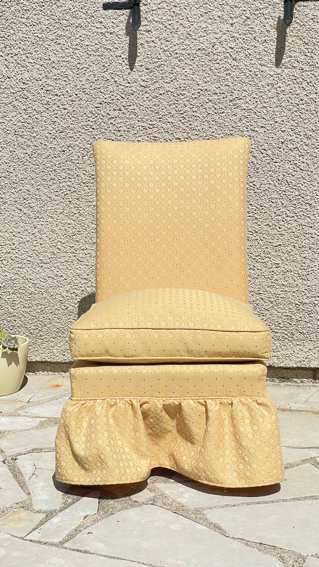 Vintage upholstered fabric toad armchair