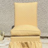 Vintage upholstered fabric toad armchair